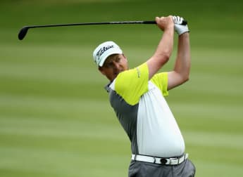 Record-matching Henning holds slender advantage