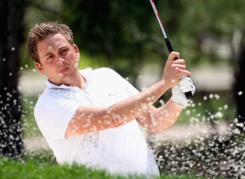 Whitehouse moves into lead