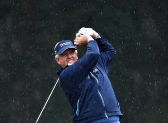 Montgomerie makes his move before rain delays Senior Open