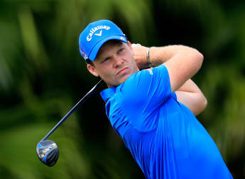 Willett happy to be in the hunt