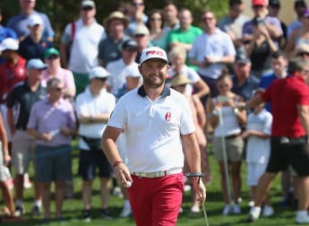 Sullivan maintains slender lead