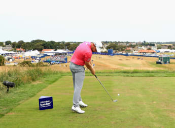 Late chip-in gives Hatton clubhouse lead