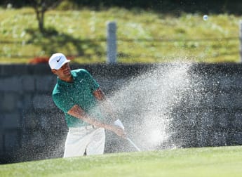 Slender lead for Finau in China