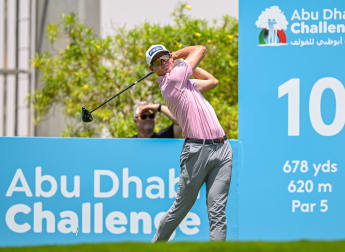 Nienaber sets course record to share lead in Al Ain