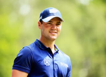 Kaymer charges into contention