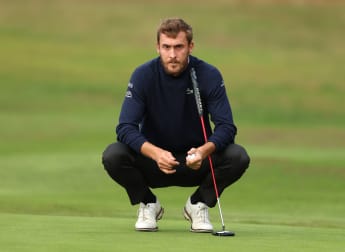 Coussaud leads with play suspended in England