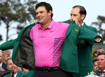 Reed holds nerve to claim maiden Major at Augusta