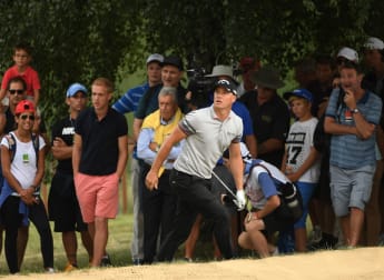 Noren happy to stay in contention