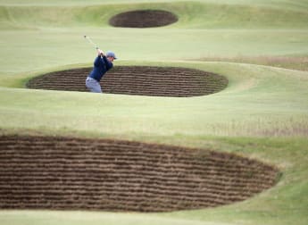 Dunne tops congested leaderboard