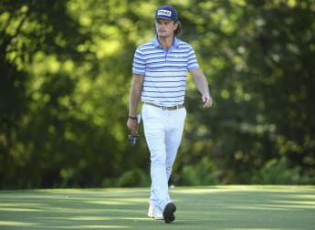 Schott sets course record to lead in Denmark