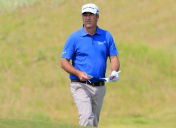 Dennis takes slender lead in Germany