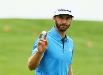 Johnson holds on to Oakmont lead