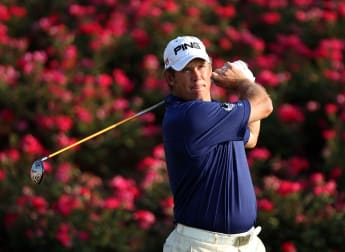 Westwood remains on course