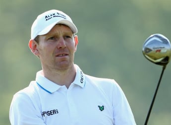 Gallacher storms into clubhouse lead