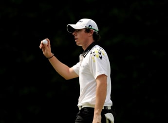 McIlroy strides closer to glory