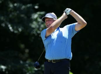 Montgomerie leads with Langer hot on his heels