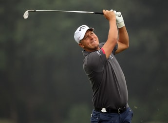 Jacobson charges into clubhouse lead