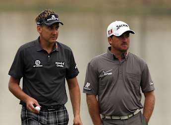 Poulter and McDowell turn heat on Race leader Stenson