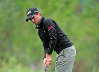 Parry holds one shot lead