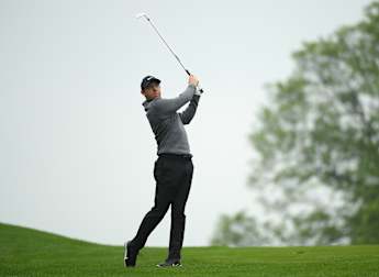 McIlroy moves ahead