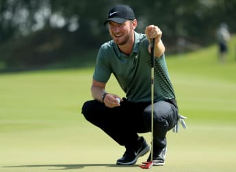 Wood glides into Oman lead