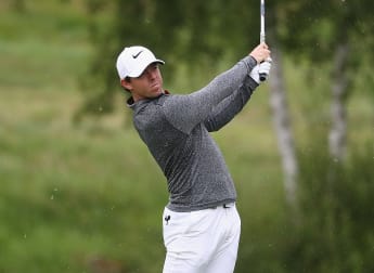 McIlroy surges into share of Paris lead