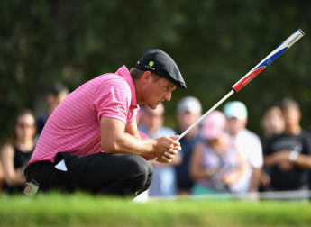 DeChambeau tops Dubai leaderboard with Herbert