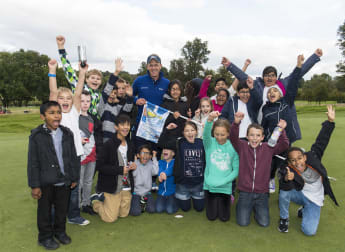 Local School Children take over the 16th hole at the British Masters