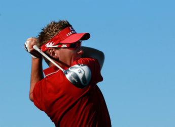 Poulter beats Westwood to progress