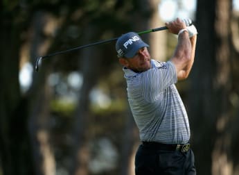 Westwood and McIlroy one step from last 16