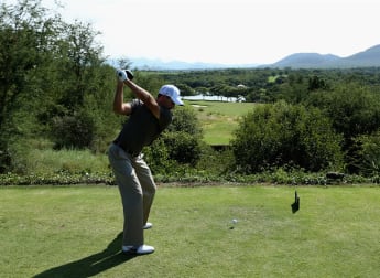 Record-breaker Schwartzel poised for history bid