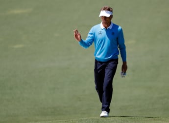 Langer surges into Masters contention