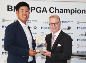 An presented with Graduate of the Year Award