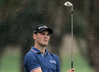 Kaymer races three clear