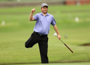 Late birdies hand Clark clubhouse lead