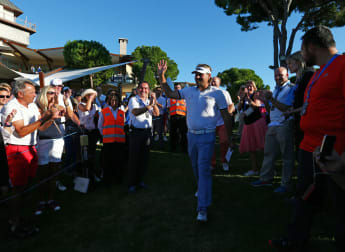 Dubuisson flies into Race to Dubai top 10