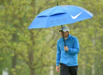 McIlroy moves ahead at stormy K Club