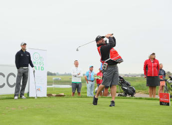 Caddies showcase their golf skills for charity