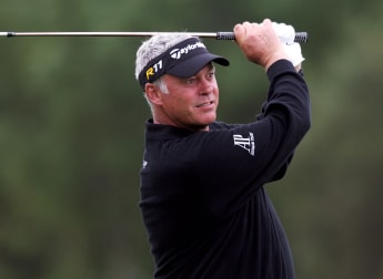 Clarke paired with Woods at Firestone