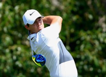 McIlroy fights back to defeat Olesen