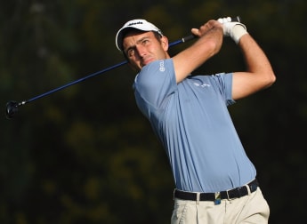 Molinari and Wilson move into contention