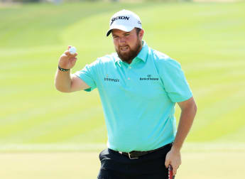 Lowry leads in Abu Dhabi after matching course record