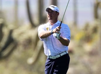 Westwood safely through