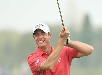 Comfortable Colsaerts takes share of Portugal lead