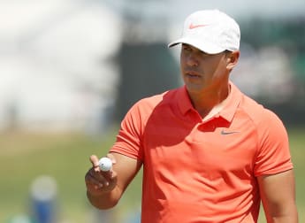 Koepka edges ahead on tough afternoon