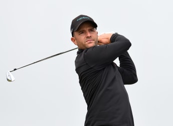 Schneider takes Bridgestone Challenge clubhouse lead
