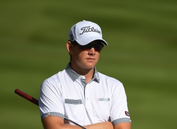 Hansen hole-in-one helps him to KPMG lead