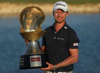 Big finish hands Harding maiden title in Qatar