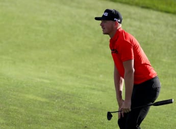 Wallace breaks course record at The International