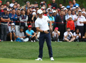 McIlroy maintains slender lead in China